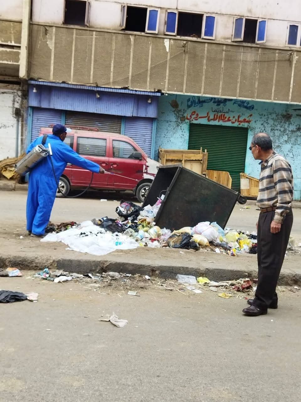 أعمال التطهير والرش بقنا