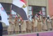 مواطن يحتفل بنصر أكتوبر في مدرسته السابقة بقنا